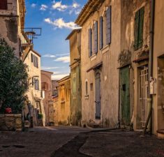 Best Deal Travels - Street with old houses in ancient French village