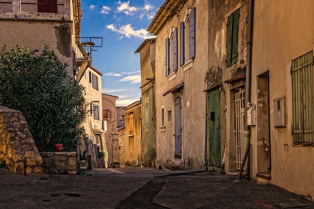Best Deal Travels - Street with old houses in ancient French village