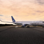 SAS A350 on runway in twillight