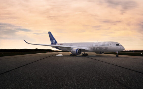 SAS A350 on runway in twillight