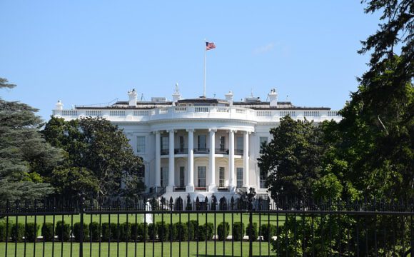 The White House in Washington D.C. during a sunny day.